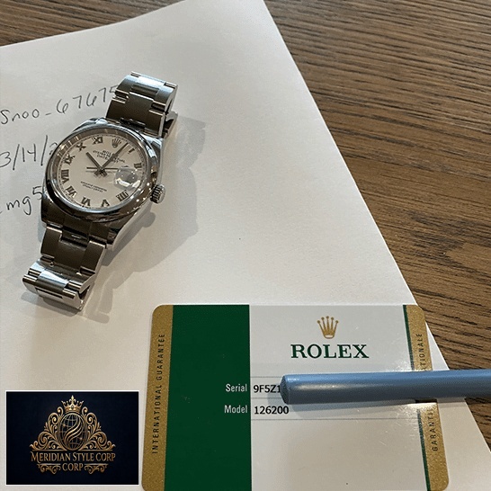 Rolex datejust Replica watch and warranty card on the table