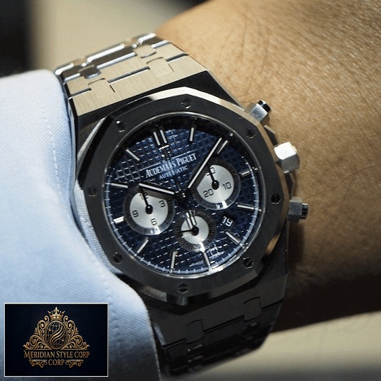 Audemars Piguet Royal Oak Blue Dial Steel Replica on the man wrist push button