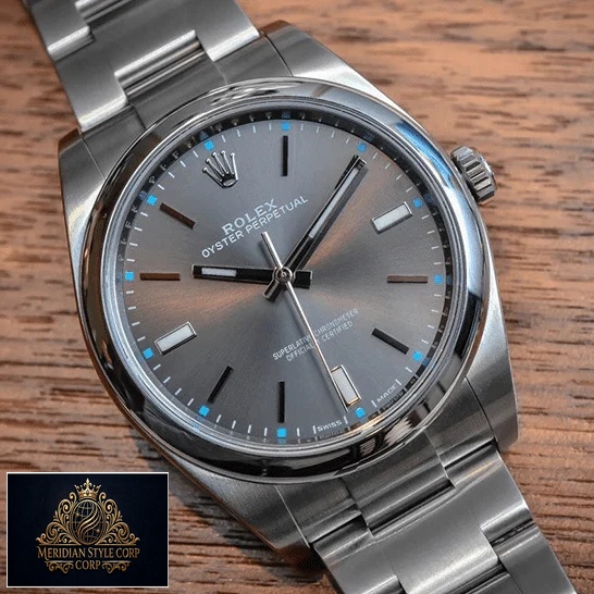 Rolex Datejust Perpetual 114300 Replica dial is a dark rhodium grey with luminescent hands and hour markers