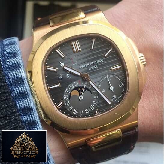 Patek Philippe Nautilus Black Dial Rose Gold Replica on the man wrist