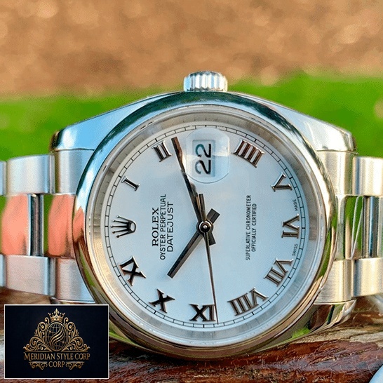 Rolex Oyster Perpetual Datejust White Dial 116200 Replica on the Table
