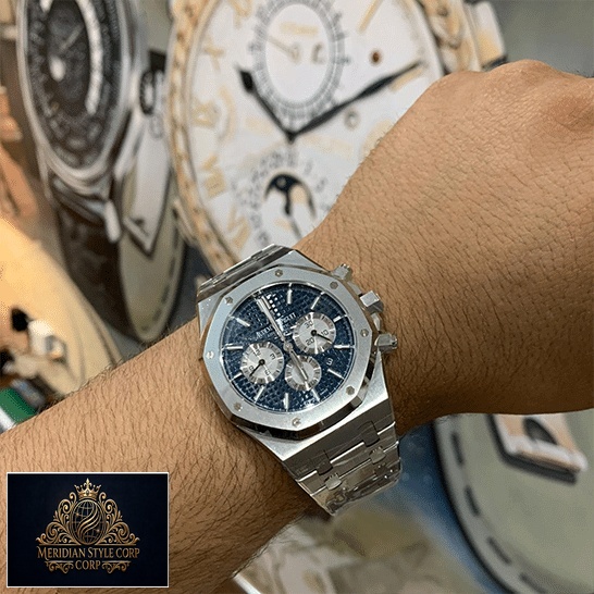 Audemars Piguet Stainless Steel Blue Dial Replica on the man wrist watch background