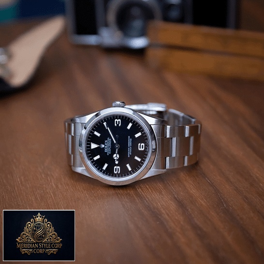 Rolex Explorer 124270 Stainless Steel Replica on the table