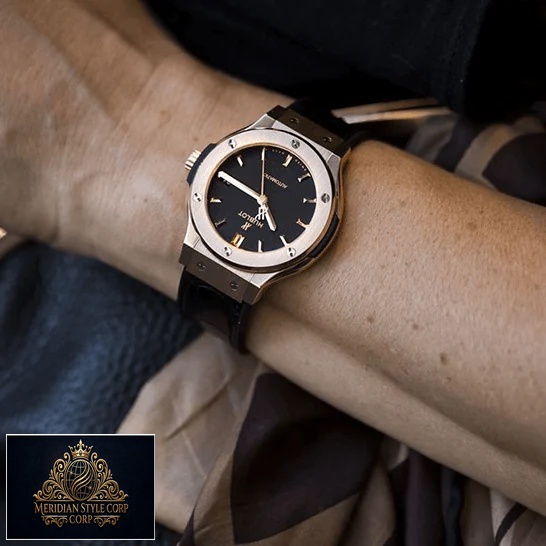 Hublot Classic Fusion Gold Bezel Black Dial Replica on the man wrist