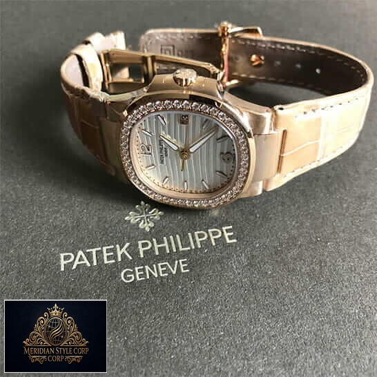 Patek Philippe 7010 Diamond Bezel Leather Bracelet Replica on the grey carpet