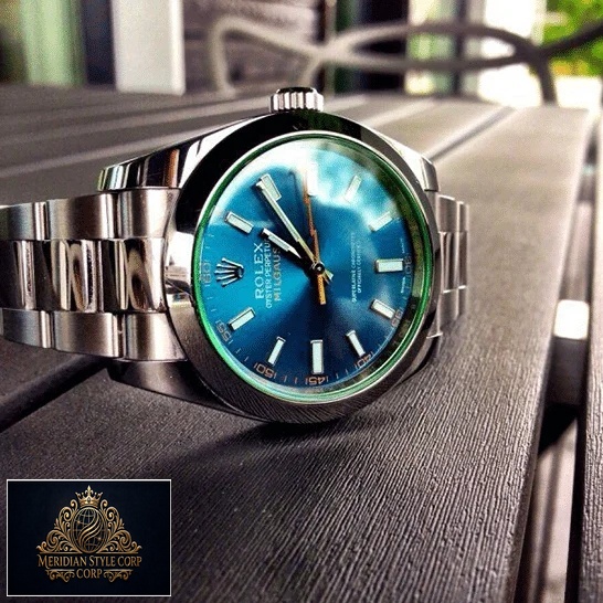 Rolex Milgauss 116400GV-0002 Oyster Bracelet Replica on the table