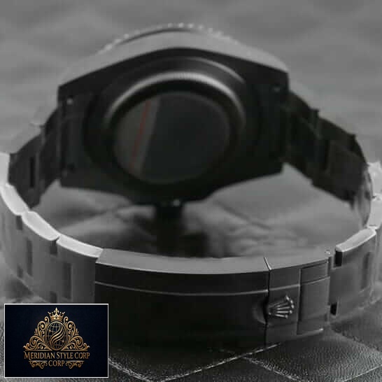 Rolex Blaken Submariner Oyster Bracelet and Clasp on the Black Table