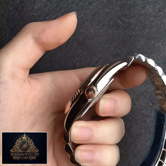 Rolex Gold 228238-0003 replica side view on hand and push button
