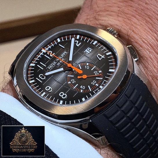 Patek Philippe Aquanaut 5968A001 Black Dial Replica on the man wrist