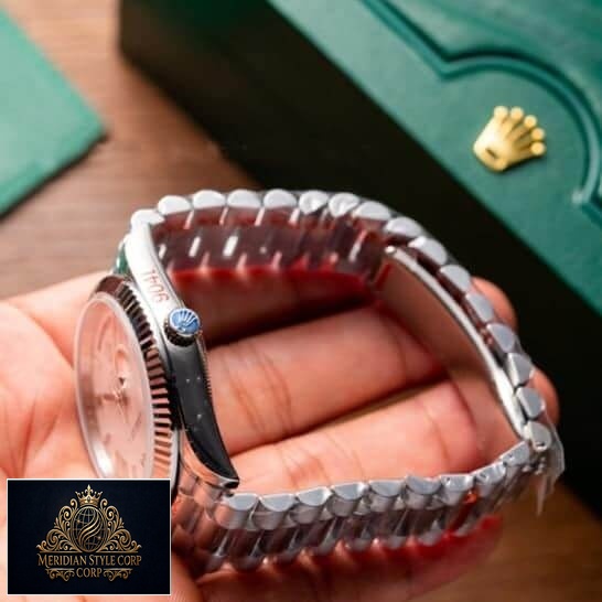 Rolex 228239-0033 replica side view on the hand and rolex logo