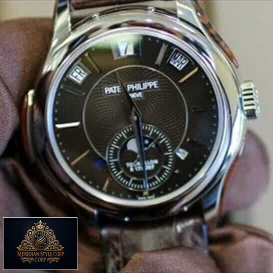 Patek Philippe Geneve Black Dial Steel Case Replica on the hand
