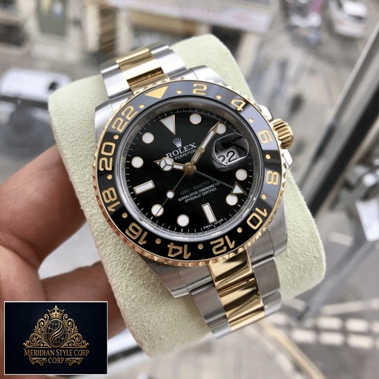 Rolex GMT-Master II 116713 dial is black with stick and dot indices Replica