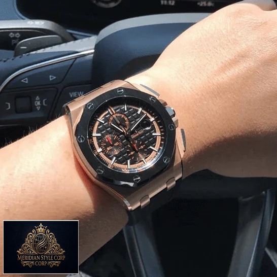 Audemars Piguet Black Bezel Replica on the steering wheel on a man's wrist