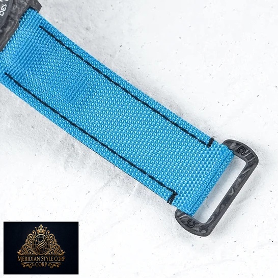 Rolex Daytona Cosmograph Blue Textile Bracelet Replica on the Table