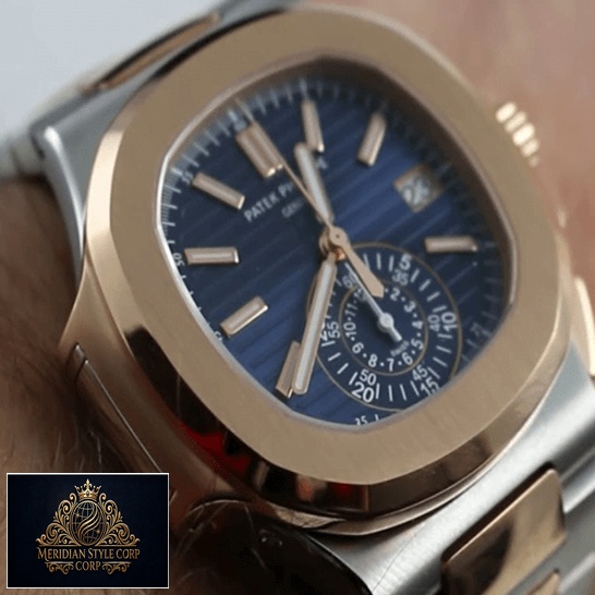 Patek Philippe Nautilus Blue Dial Gold Bezel Replica on the man wrist