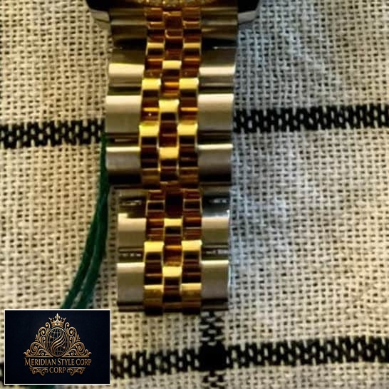 Rolex Datejust 279383RBR-0003 Yellow Gold Jubilee Bracelet Replica on the table