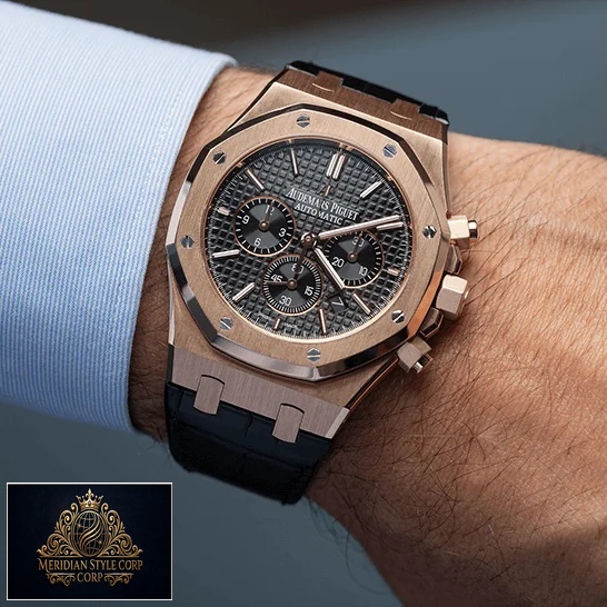Audemars Piguet Royal Oak Black Dial Gold Case Replica on the man wrist