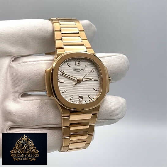 Patek Philippe Rose Gold White Dial Replica on the white glove hand white background