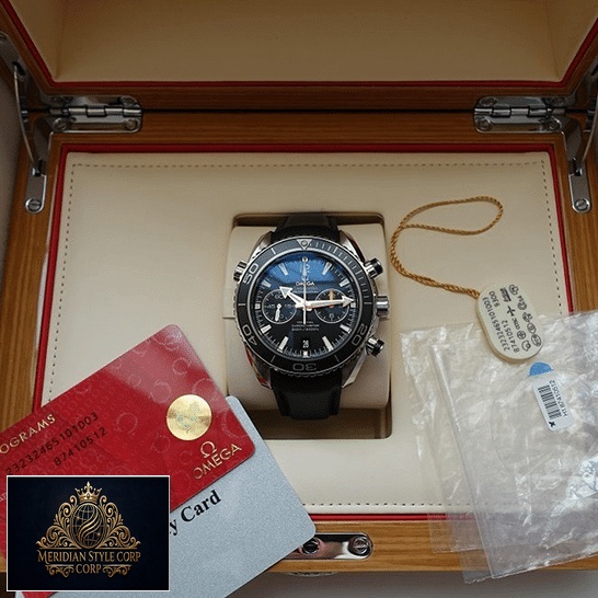 Omega Seamaster Full Blue Replica in the box next to warranty card