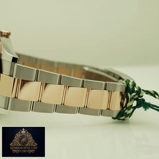 Rolex Datejust 41 126331-0013 Two Tone Oyster Bracelet Replica on the table