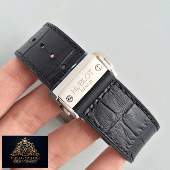 Hublot Geneve Classic Fusion Leather Black Bracelet Replica on the hand grey background