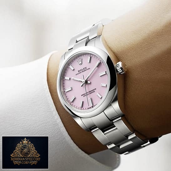 Rolex Oyster Perpetual 124300 Pink Dial Oyster Replica on his arm