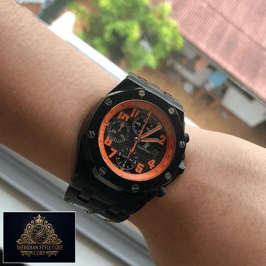 Audemars Piguet Royal Oak Orange Dial Replica on the man wrist