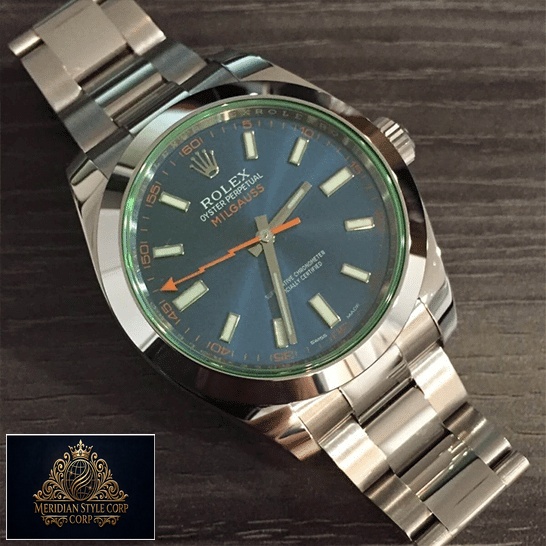 Rolex Milgauss 116400GV-0002 Green Sapphire Crystal and Blue Dial Oyster Replica on the table