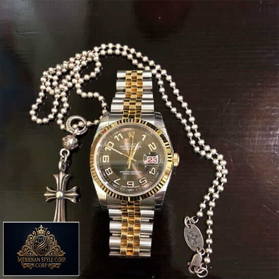 Rolex Datejust Steel Yellow Gold 116233 Replica next to the necklace