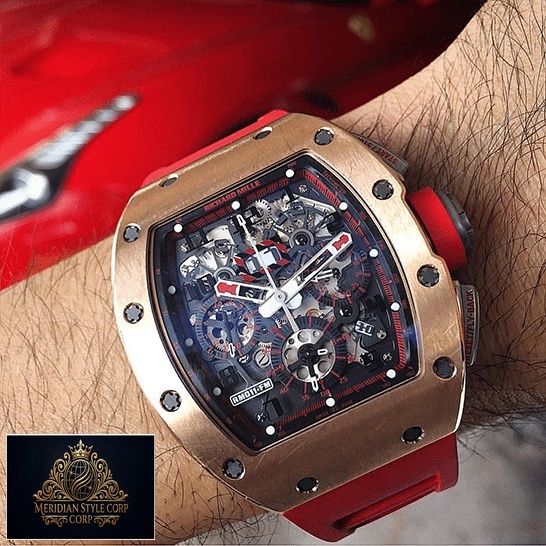 Richard Mille RM011 Red Demon Black Dial Gold Bezel Replica on the man wrist