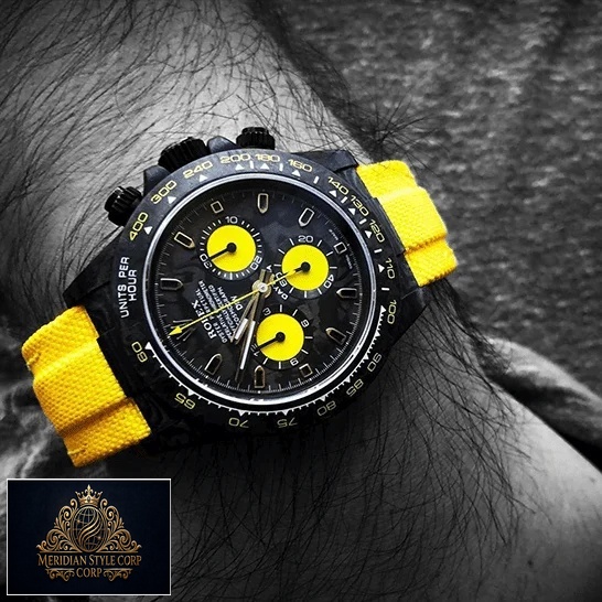 Rolex Daytona DiW NTPT “All Carbon Lemon Edition” Replica on his arm