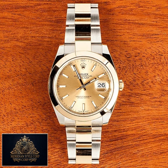 Rolex Datejust 126303 Gold Dial Replica on a wooden table