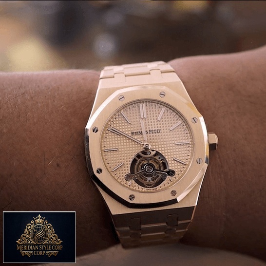Ap Royal Oak Tourbillion Gold Replica on the man wrist