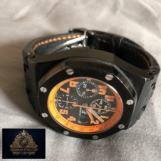 Audemars Piguet Royal Oak Orange Black Dial Replica on the white carpet