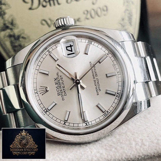 Rolex Datejust 178240 Silver Dial Oyster Replica on the table