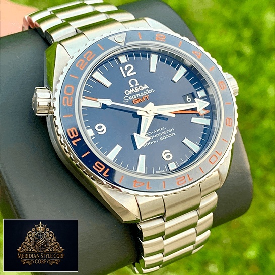 Omega Seamaster Gmt Blue Bezel & Dial Replica steel grass background