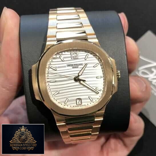 Patek Philippe Rose Gold White Dial Replica on the stand
