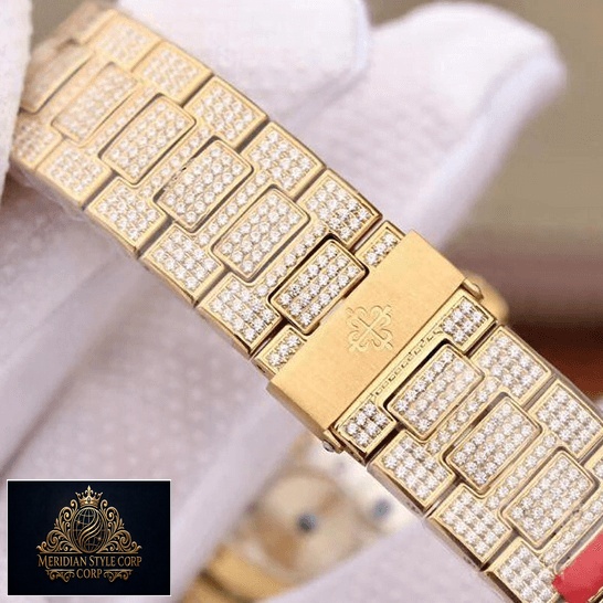 Patek Philippe Diamond Gold Bracelet Replica on the glove white hand