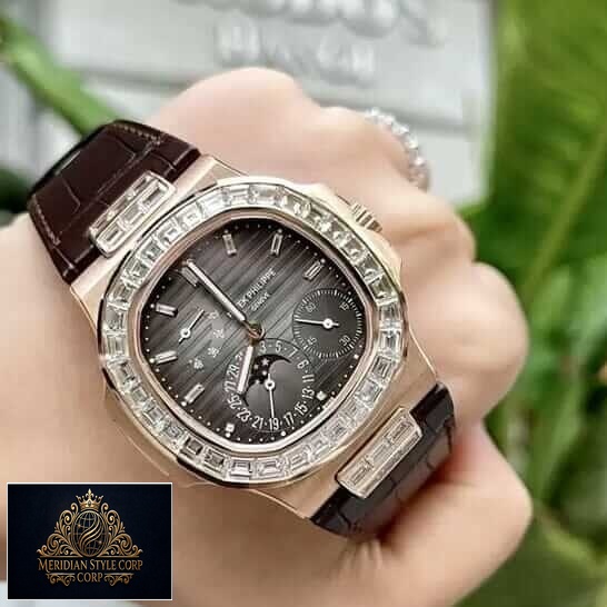 Patek Philippe Gold Case Diamond Bezel Black Dial Replica on thhe hand