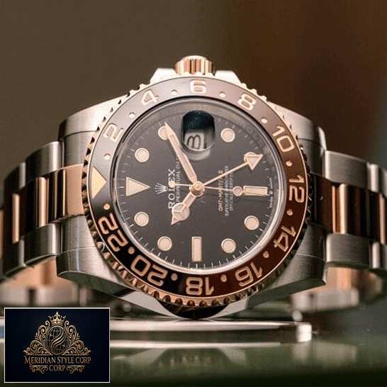 Rolex GMT-Master II Black Dial Ceramic Indices 126711CHNR-0002 Replica on the table