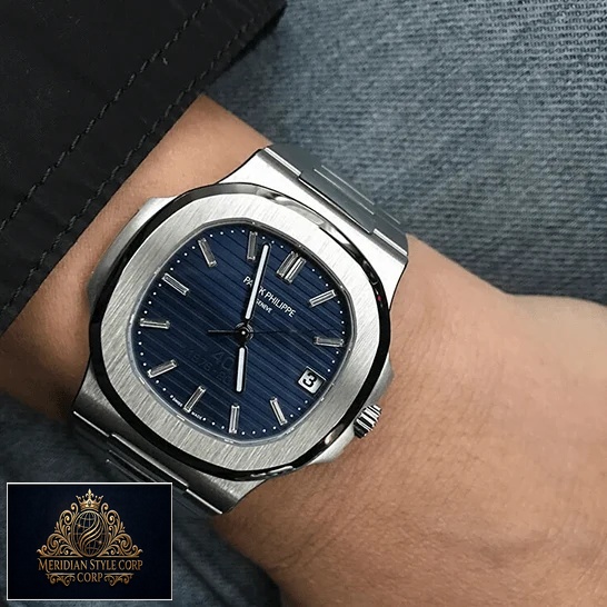 Patek Philippe Nautilus Platinum Blue Dial Replica on the man wrist