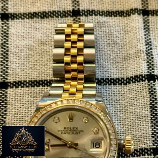 Rolex Datejust 279383RBR-0003 Two Tone Jubilee Bracelet Replica on the table