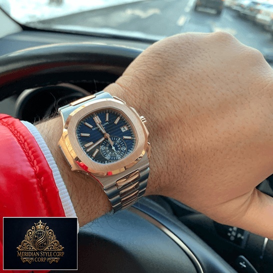 Patek Philippe Nautilus Blue Dial Steel Bracelet Replica on the wrist in car