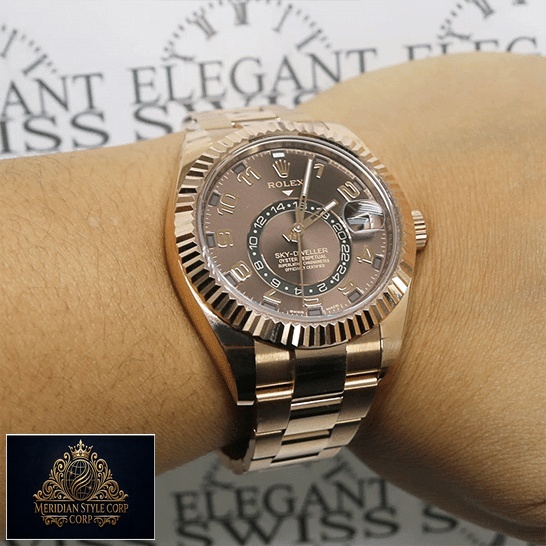 Rolex Sky-Dweller Chocolate Dial Rose Gold 326935-0003 Oyster Replica on his arm