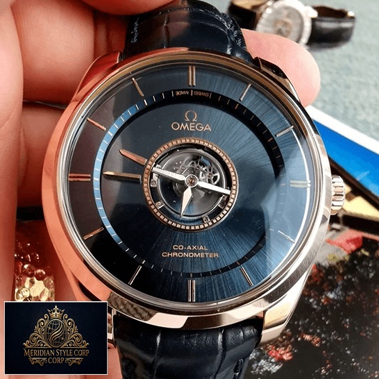 Omega Tourbillion Co Axıal Blue Dial Replica on the hand