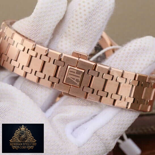 Audemars Piguet Rose Gold Bracelet Replica on the white glove hand