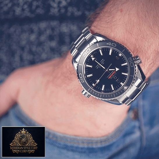 Omega Seamaster Planet Ocean Steel Black Dial Replica on the man wrist