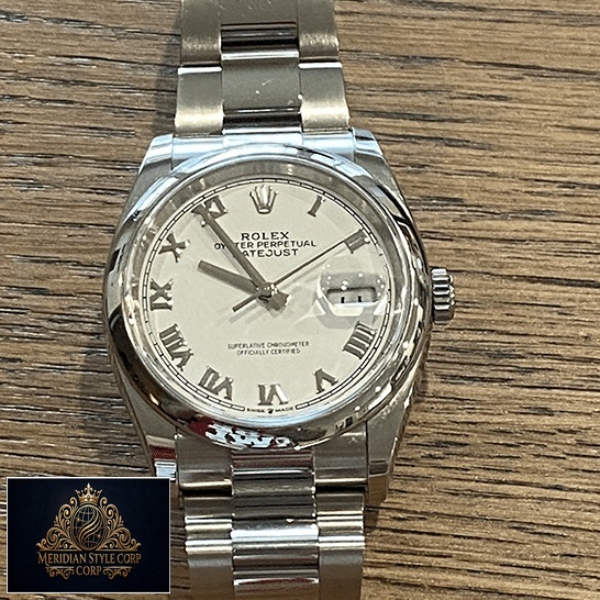 Rolex Datejust 126200-0008 White dial on the table