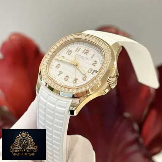Patek Philippe Aquanaut Luce Diamond Bezel Gold Case Replica red background