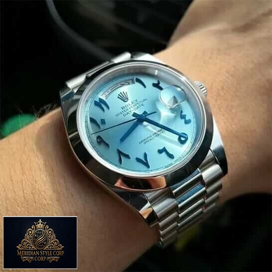 Rolex DayDate 40 228206 Turquoise Dial Replica on his arm